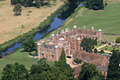 Tudor house and landscaped deer park operated by the National Trust wh...