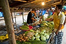 A man buying vegetables on a local market in Ao Nang