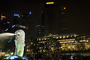 Nightshot of the fullerton Hotel and the big Merlion  statue in Singap...