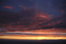 Aerial shot of a gorgeous sunrise over Munich/Bavaria. Alps in the bac...