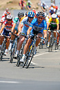 Joel Pearson tucks behind, as Mathew White of Discovery Team takes a t...