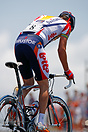 Davitamon Lotto team member Nick Gates climbing out of the saddle in t...