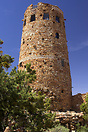 A closeup shot of the Desert View Watchtower. The external pueblan con...