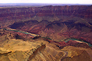 An aerial shot of the Grand Canyon showing the Colorado River as it wi...