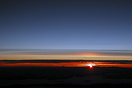 The sun is rising somewhere over the Swiss Alps