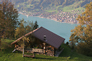 Typical Swiss chalet with Brienz and Brienzersee as backdrop.