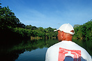 Boating along the Belize river in search of wildlife