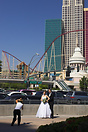 A couple getting their wedding photos taken in front of New York, New ... A couple getting their wedding photos taken in front of New York, New ...