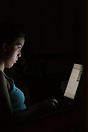 Teenage girl chatting via the internet.