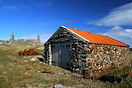 Typical of the many buildings constructed of stone and corrugated iron...