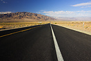 A view of the I-190 as it plunges down into Death Valley. The road dro...