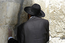 An Orthodox Jew at the Western Wall, also known as The Kotel or Wailin...