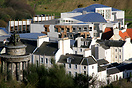 The new Scottish Parliament nestles behind old tenement buildings and ...