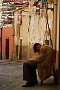 Old man sleeping in the street