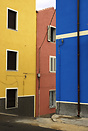 Birghtly painted houses in the streets of Orgosolo
