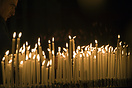 Votive candles burning in the Duomo di Milano (Milan Cathedral)