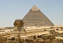 Great Sphinx of Giza with the Pyramid of Khufu (Great Pyramid) in the ...