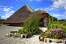 This reconstructed settlement is typical of what existed on Anglesey a...
