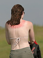 Ouch.... too much sun for this young lady
