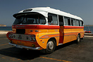 An old Leyland bus takes a break at Cirkewwa harbour awaiting passenge...