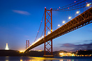 Ponte 25 de Abril (25th of April Bridge) in Lisbon at dusk