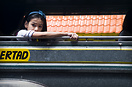 Girl in a Manila jeepney