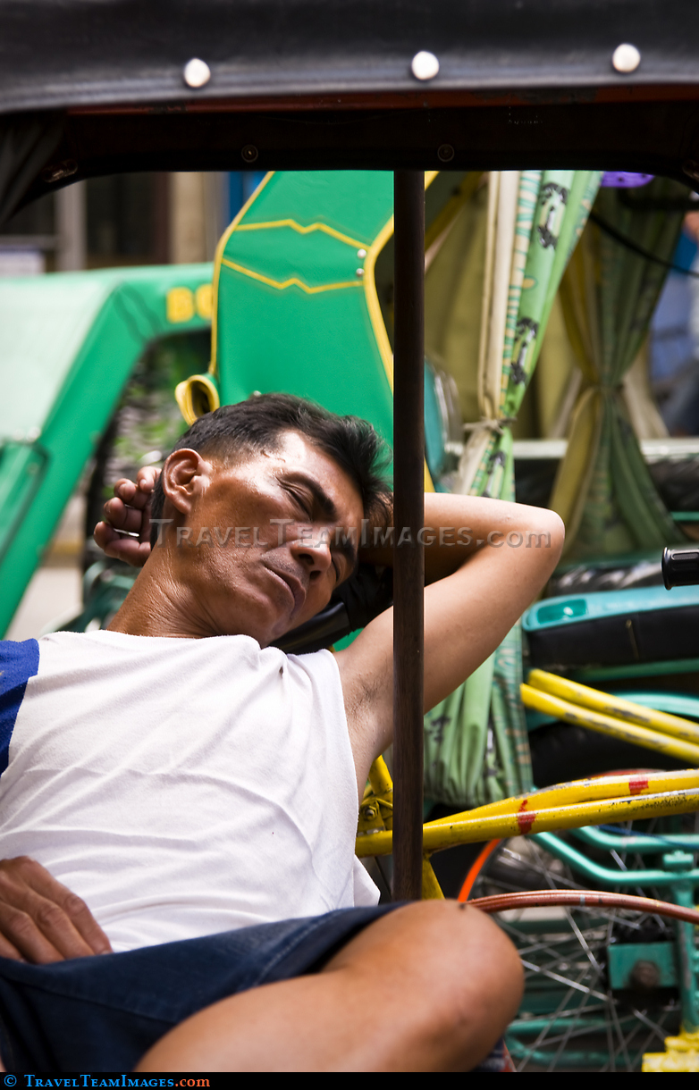 Tricycle Driver Sleeping