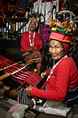 Old Ifugao women weaving in a souvenir shop near Banaue.