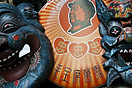 President Mao Zedong souvenir and traditional masks in Cat Street Mark...