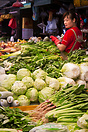 A woman in a street market on Mong Kok street, Kowloon