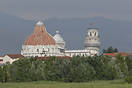 Distant view showing the Leaning Tower of Pisa which is a is the campa...